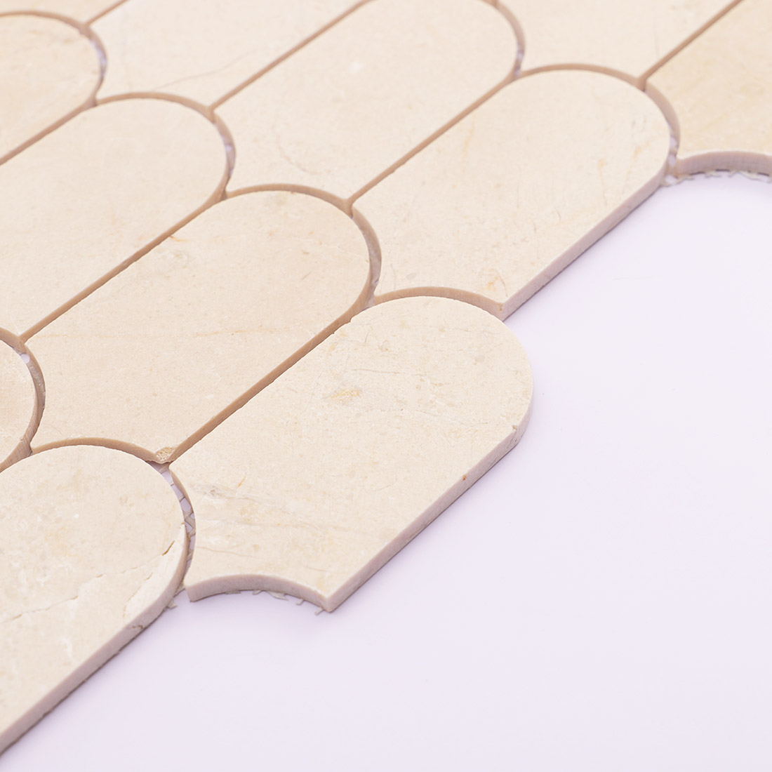 Side view showing the clean edge and thickness of beige marble tile