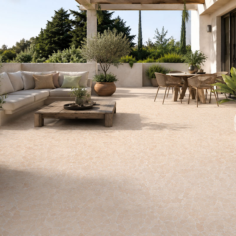 Beige stone tile patio in a modern garden terrace with outdoor seating