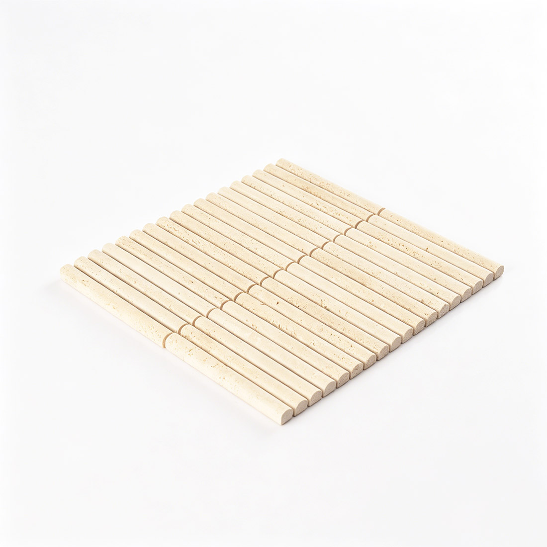 Angled perspective of beige travertine rod fluted stacked mosaic tile.