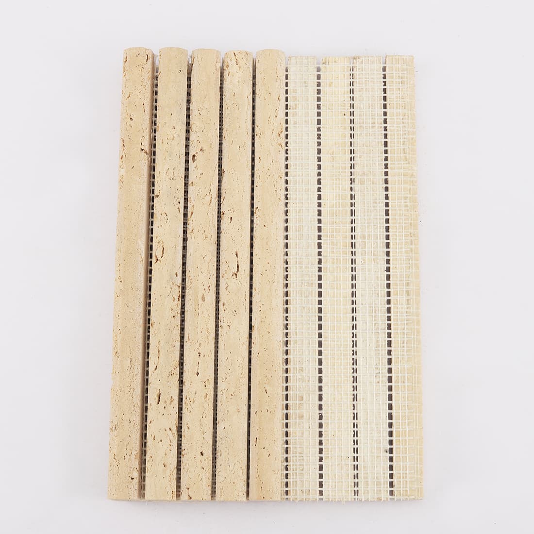 Back view of beige travertine rounded strip mosaic tile with mesh backing