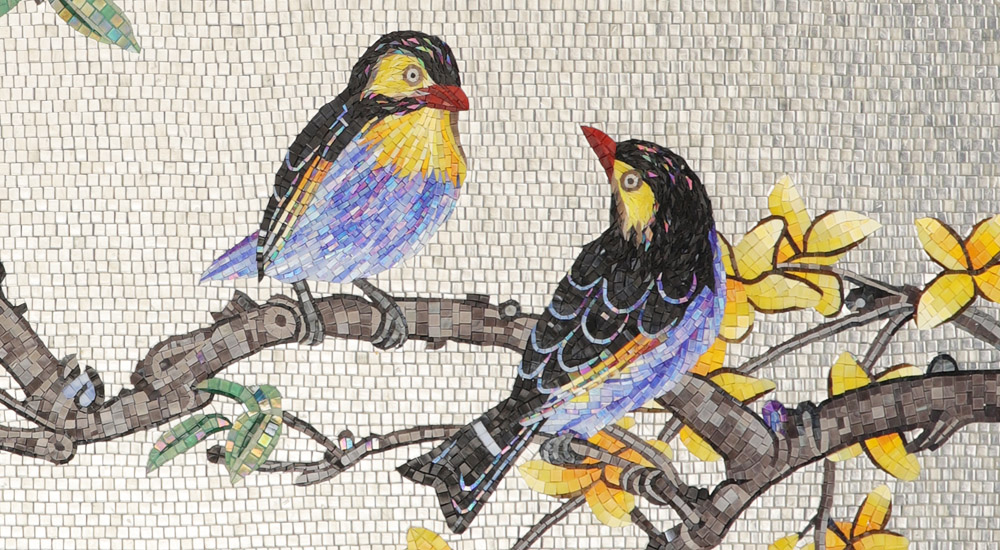 {"default":"Colorful bird mosaic mural with two birds perched on flowering branches"}
