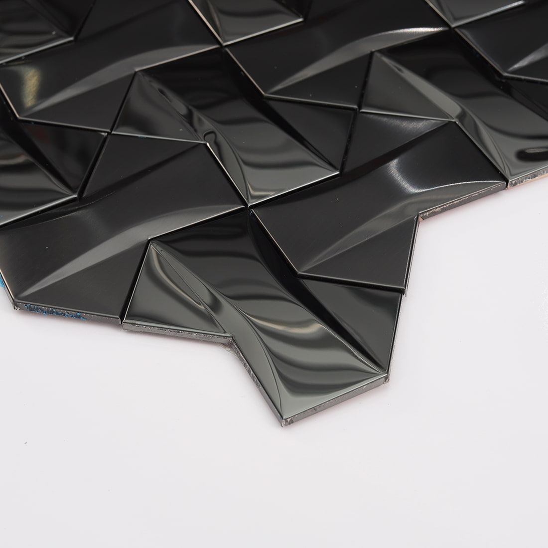 Side perspective of 3D black geometric stainless steel mosaic tile