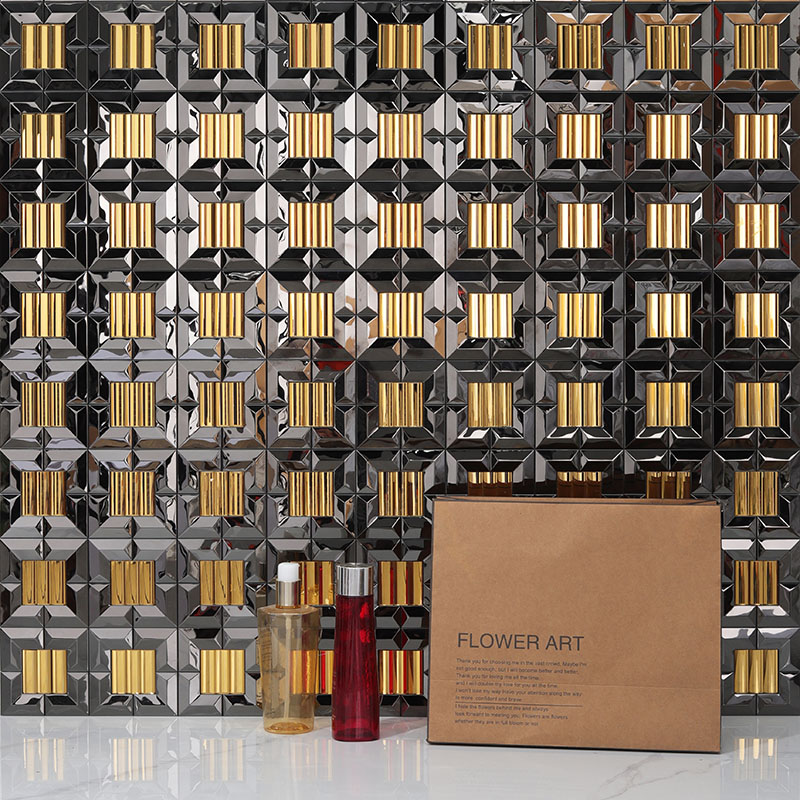 Black and gold tiles in a repeating square mosaic pattern with glossy frames and textured 