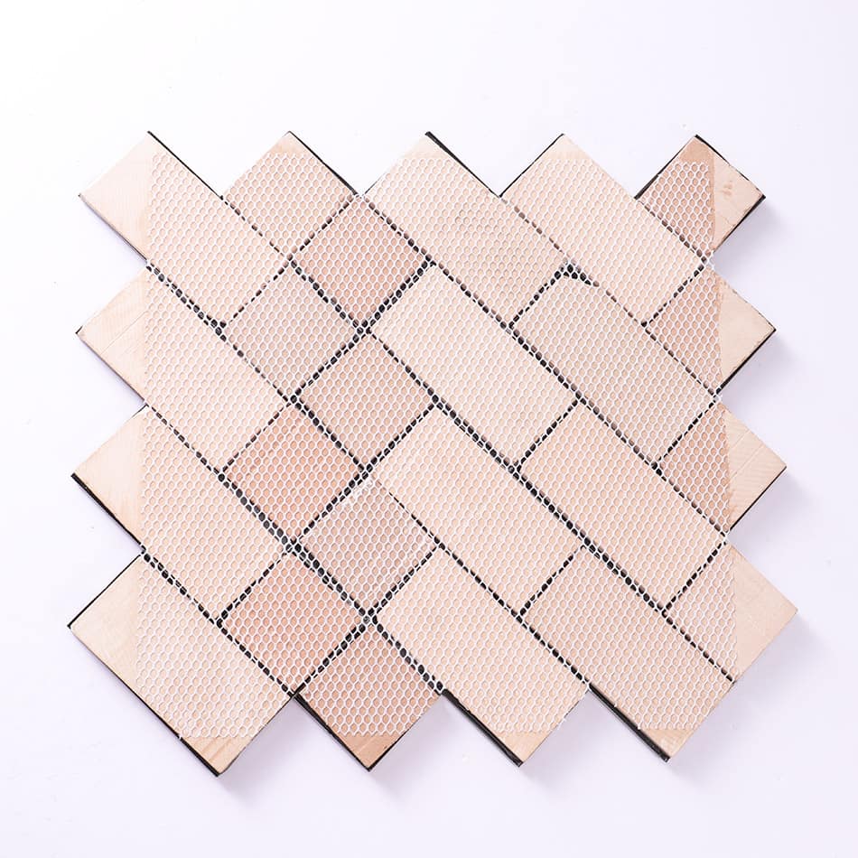 Back view of black chevron metal mosaic tile sheet