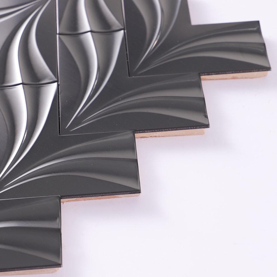 Edge detail of black chevron metal mosaic tile sheet