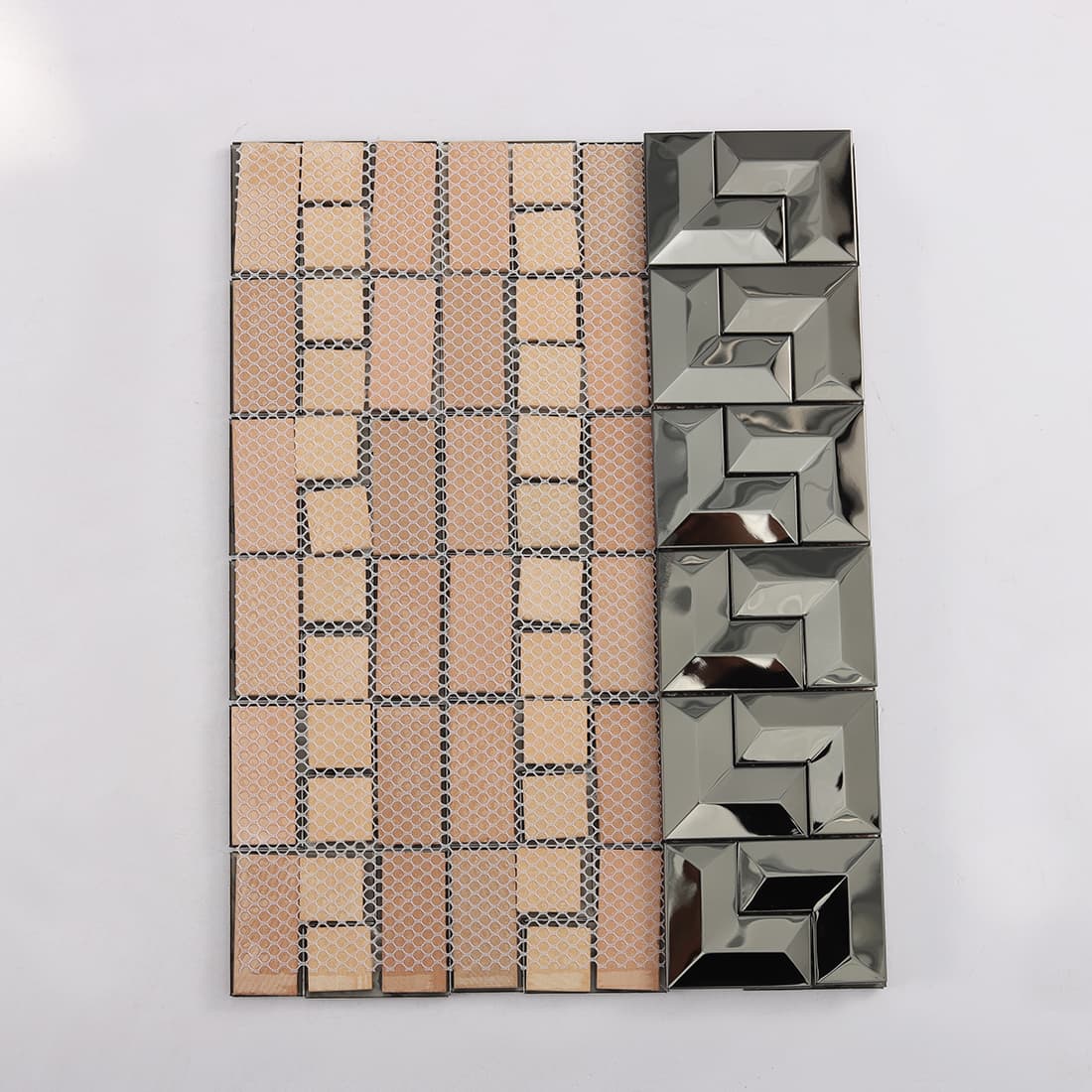 Back view of black geometric 3D metal mosaic tile with mesh backing