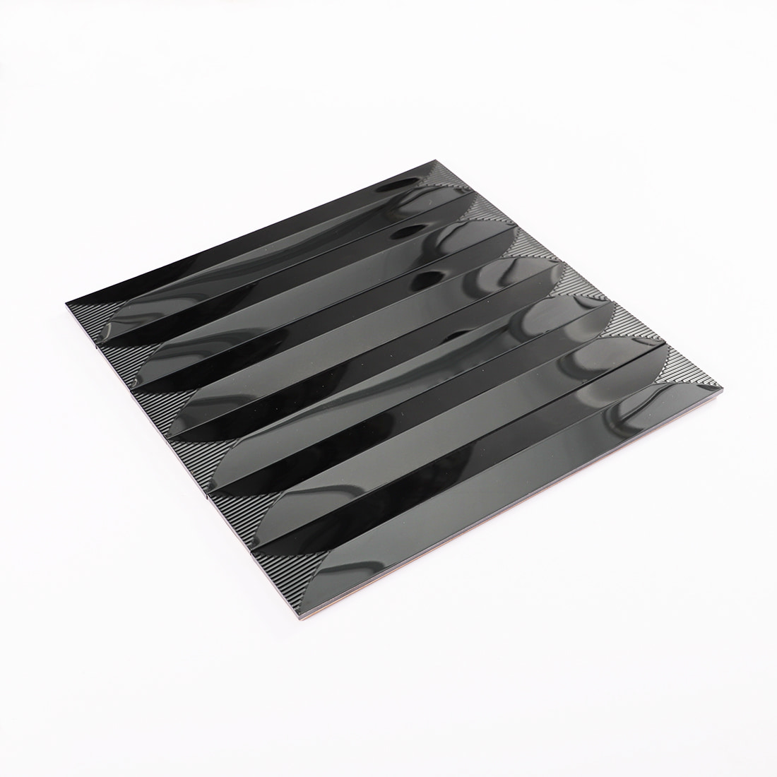Angled sheet view of black glossy elongated metal mosaic tile