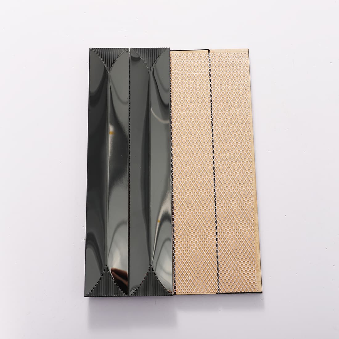 Back mesh view of black glossy elongated metal mosaic tile