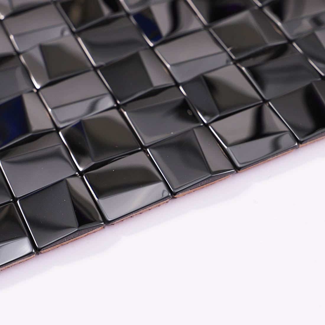 Edge detail of black glossy square stainless steel mosaic tile sheet