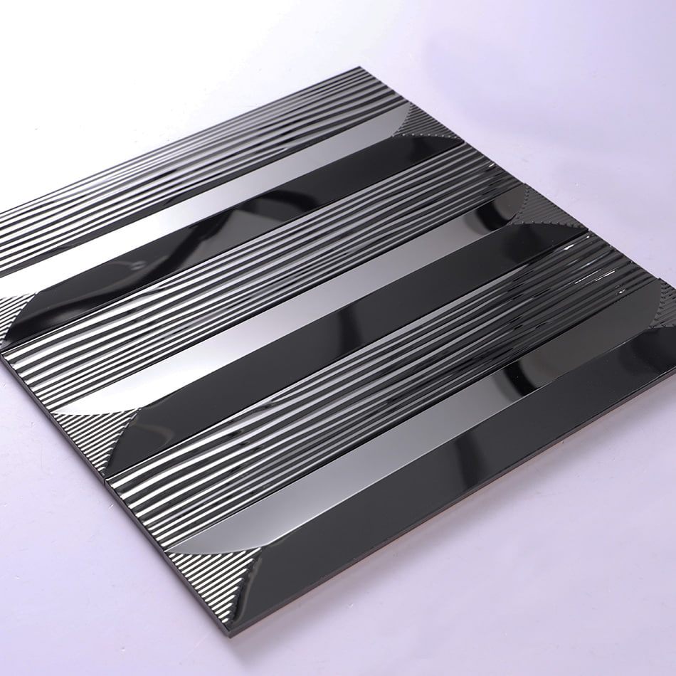 Angled sheet view of black glossy textured rectangular metal mosaic tile