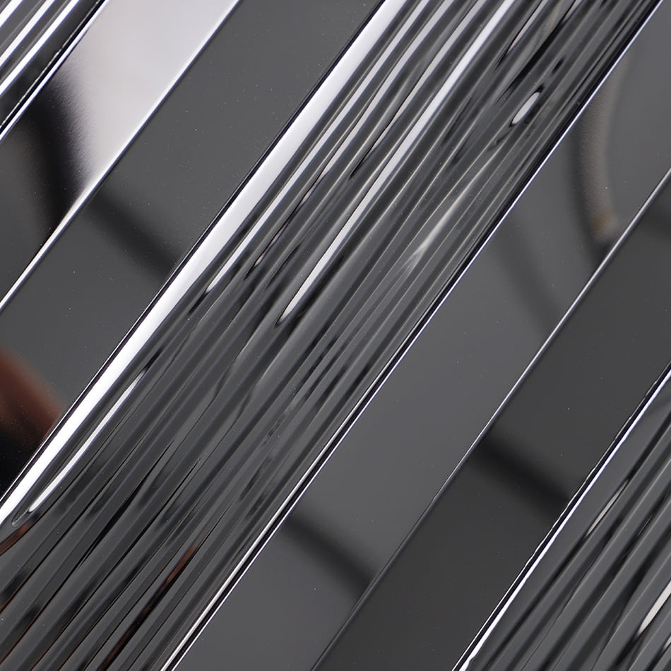 Close up of black glossy textured rectangular metal mosaic tile surface