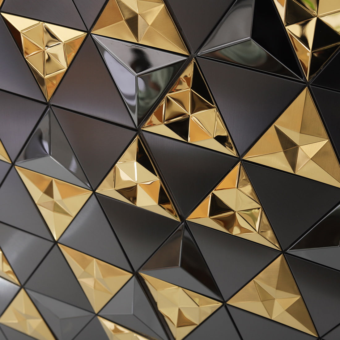 Black and gold 3D triangle mosaic wall with faceted metal texture
