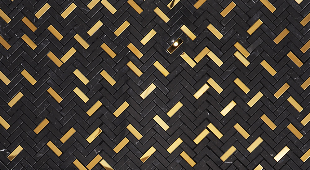{"default":"Black and gold herringbone mosaic tile pattern"}
