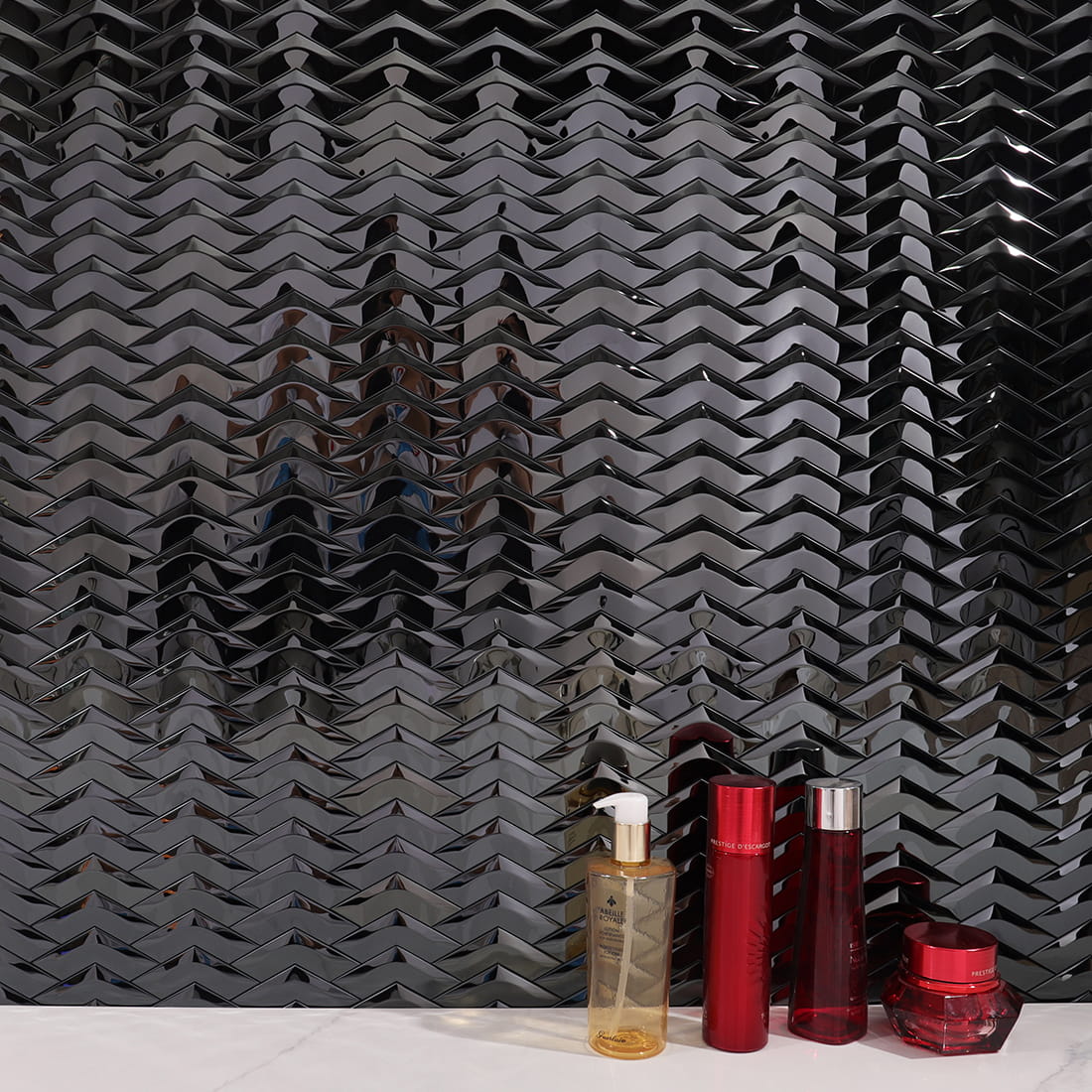 Wide view of black mirror chevron stainless steel mosaic feature wall