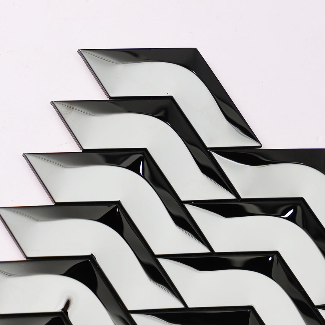 Pattern detail of black mirror chevron stainless steel mosaic tile