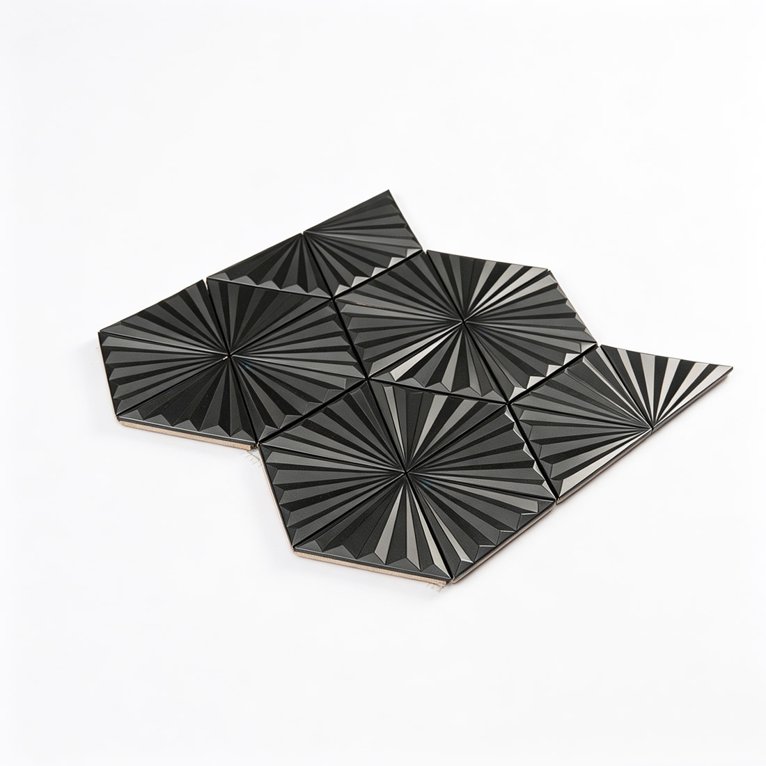 Angled sheet view of black radiating triangle stainless steel mosaic