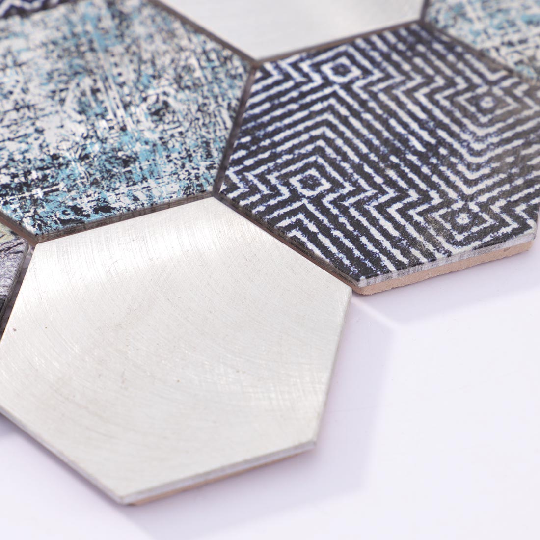 Angle shot of black silver hexagon mosaic tile showing metallic edge