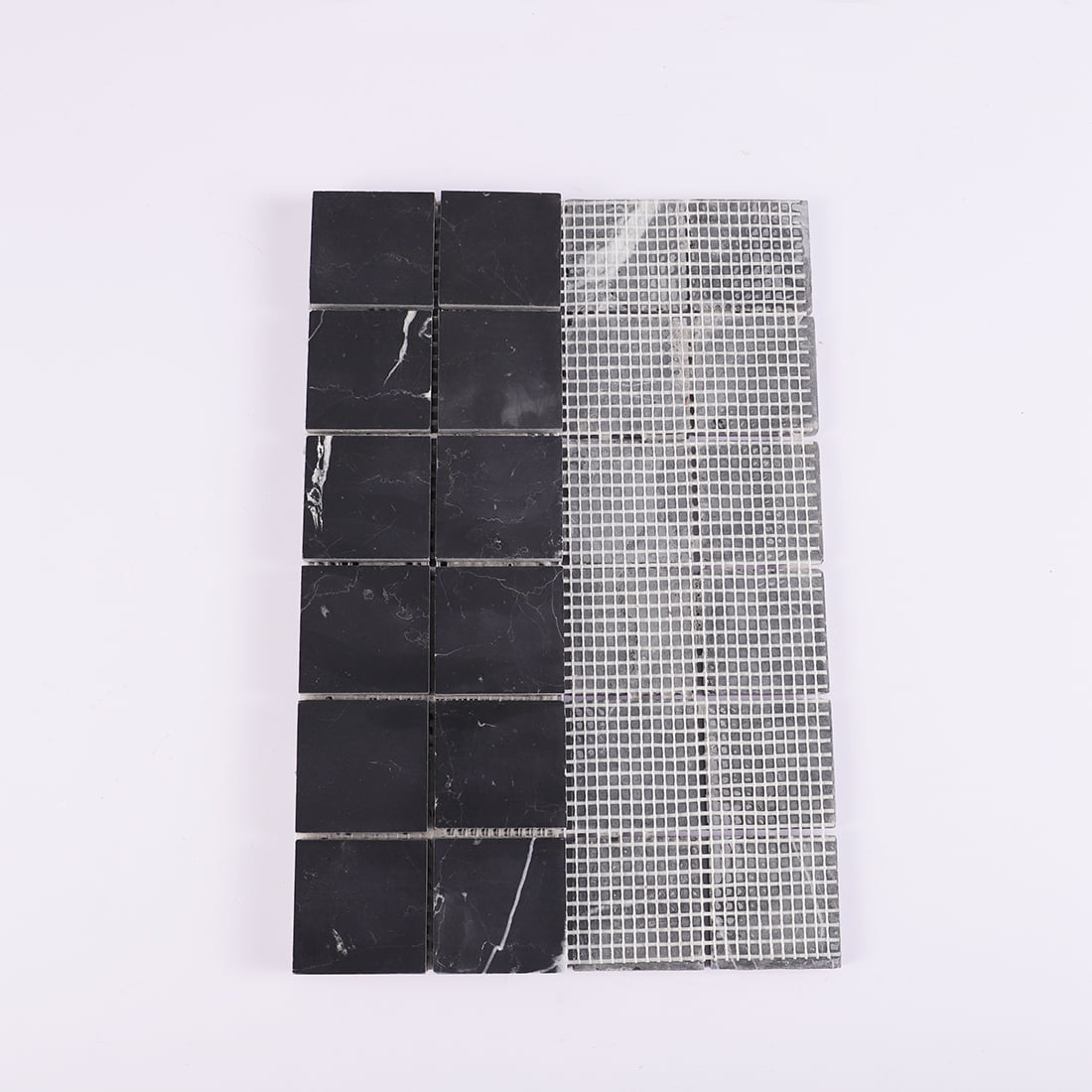 Mesh backing view of black square marble mosaic tile with partial front display