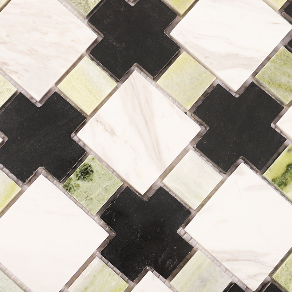Close up of mixed black white and green marble mosaic tile surface