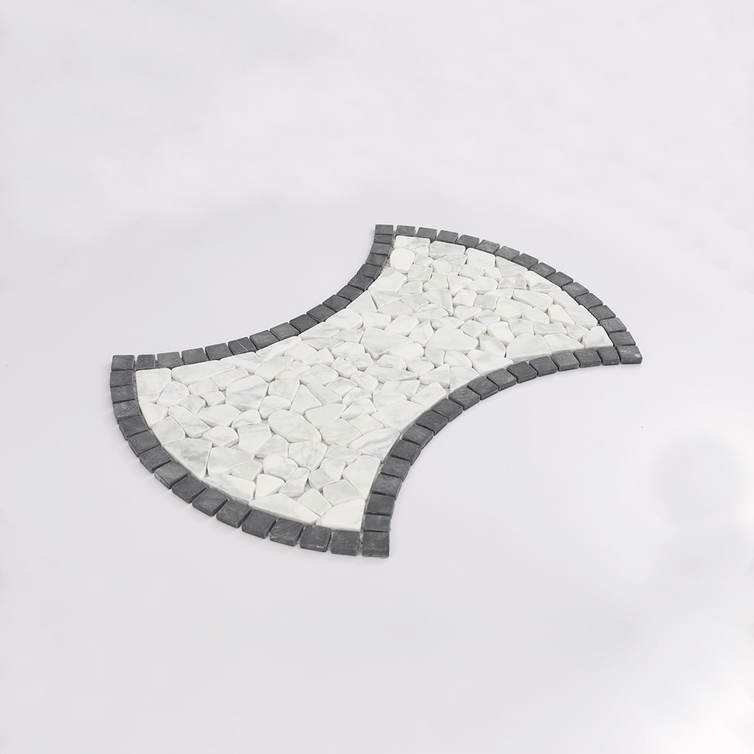 Angled view of black and white pebble marble mosaic tile