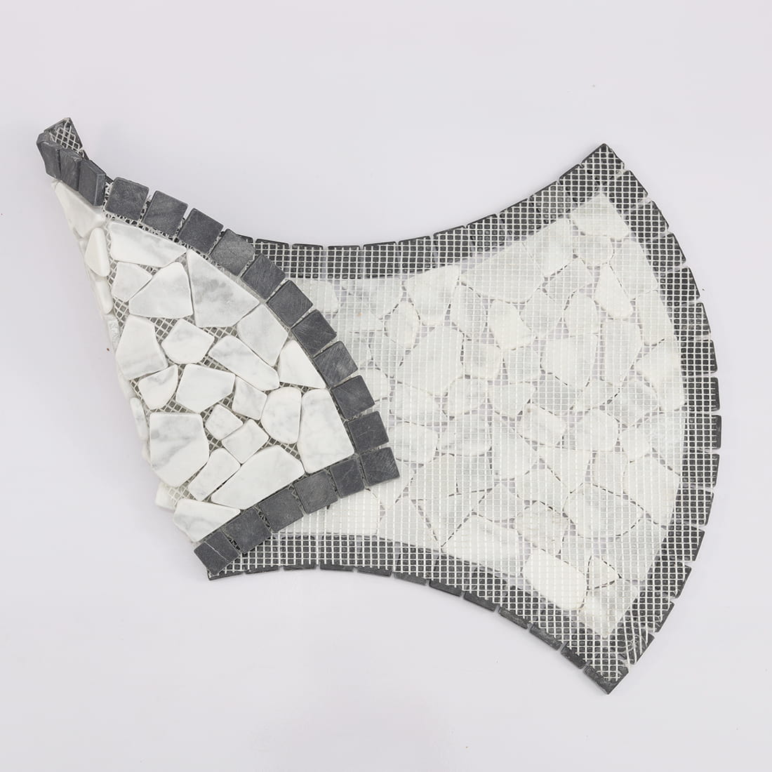 Back view of black and white pebble marble mosaic tile with mesh backing