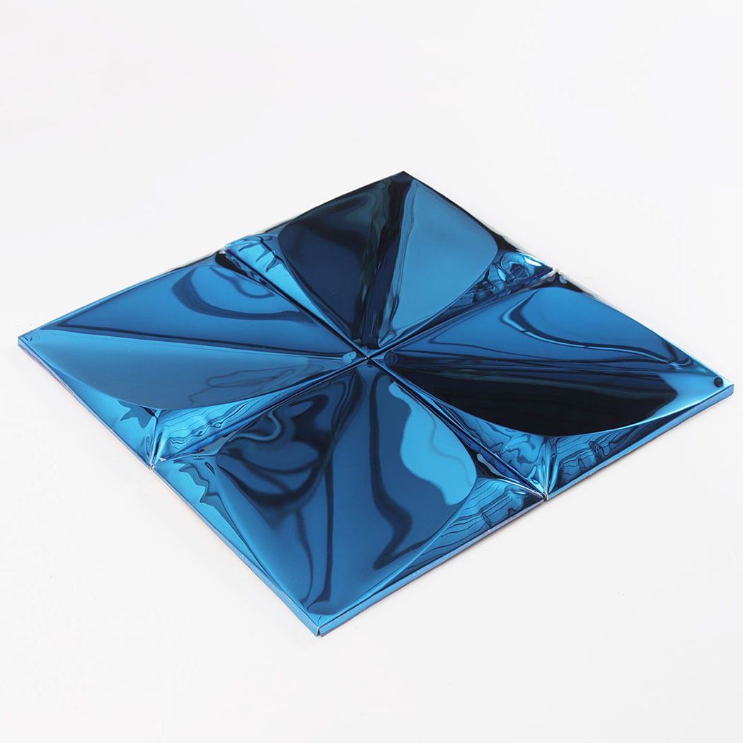 Perspective view of blue 3D pyramid metal tiles with reflective raised surface