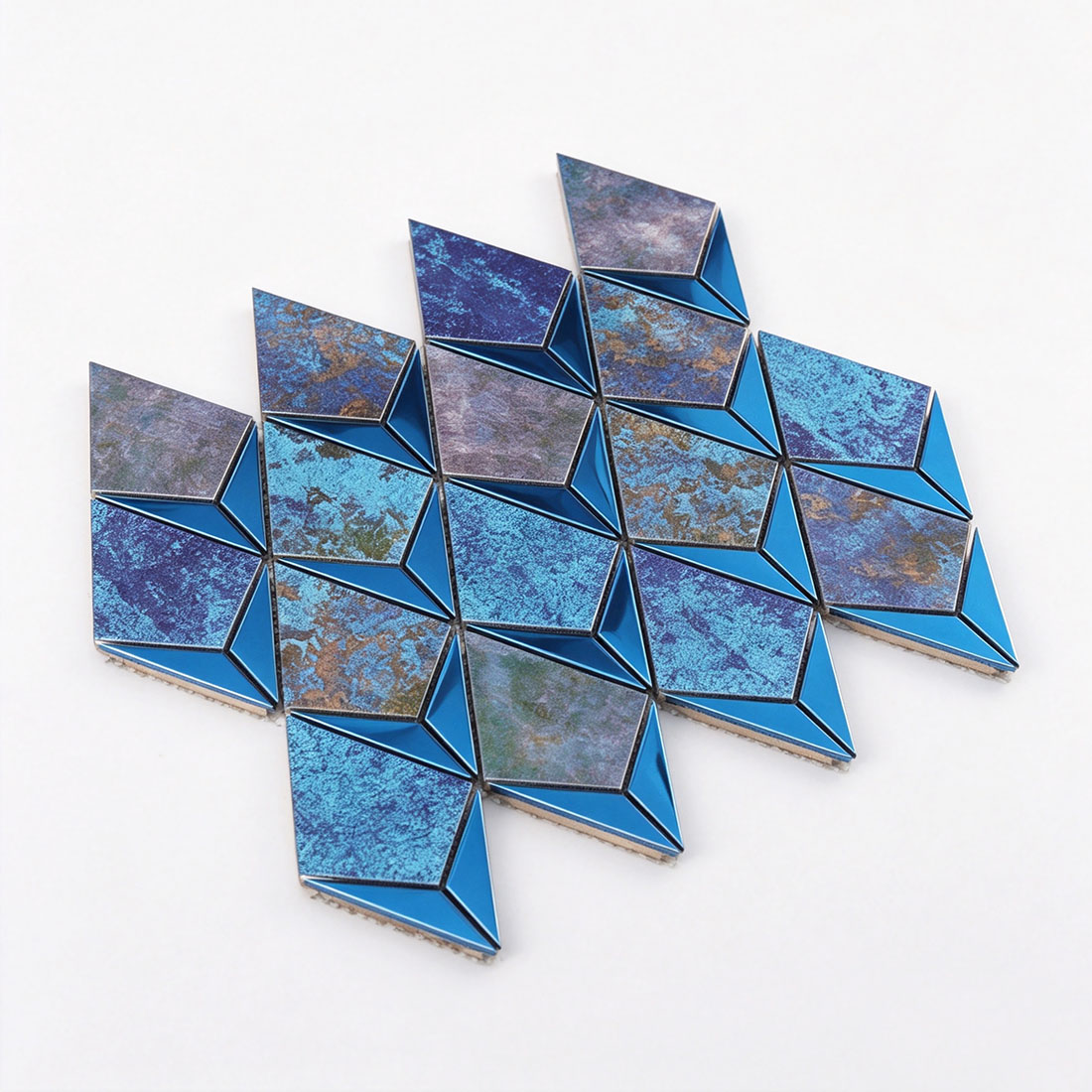 Perspective view of blue antique aluminum mosaic tiles with a faceted kite pattern