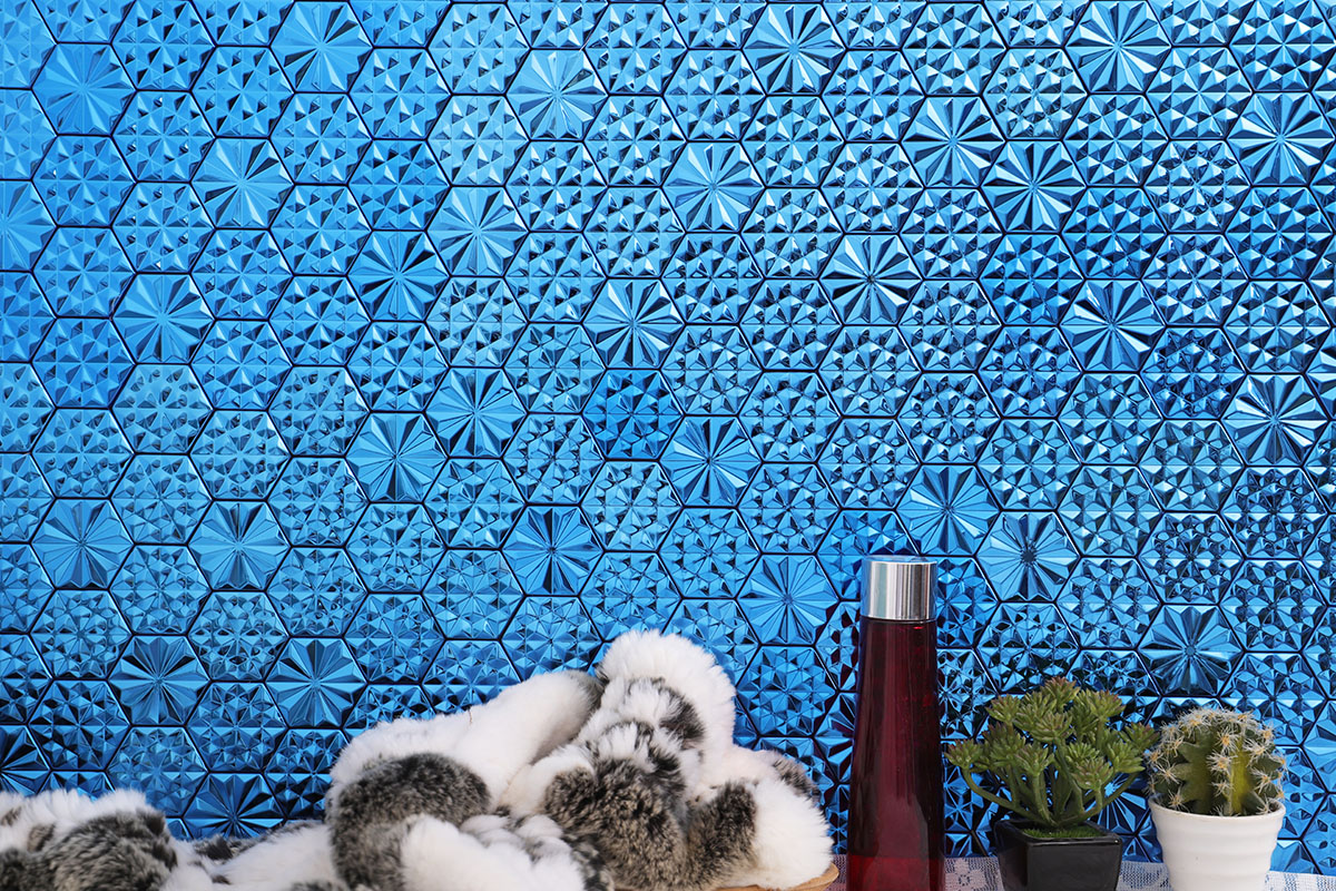 Blue faceted metal hexagon tile feature wall with geometric floral patterns