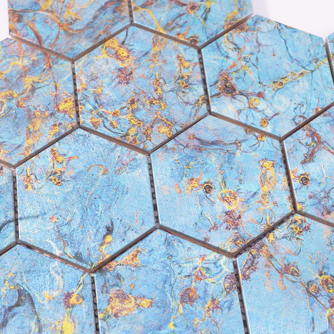 High angle view of blue gold marbled pattern hexagon aluminum tile surface texture