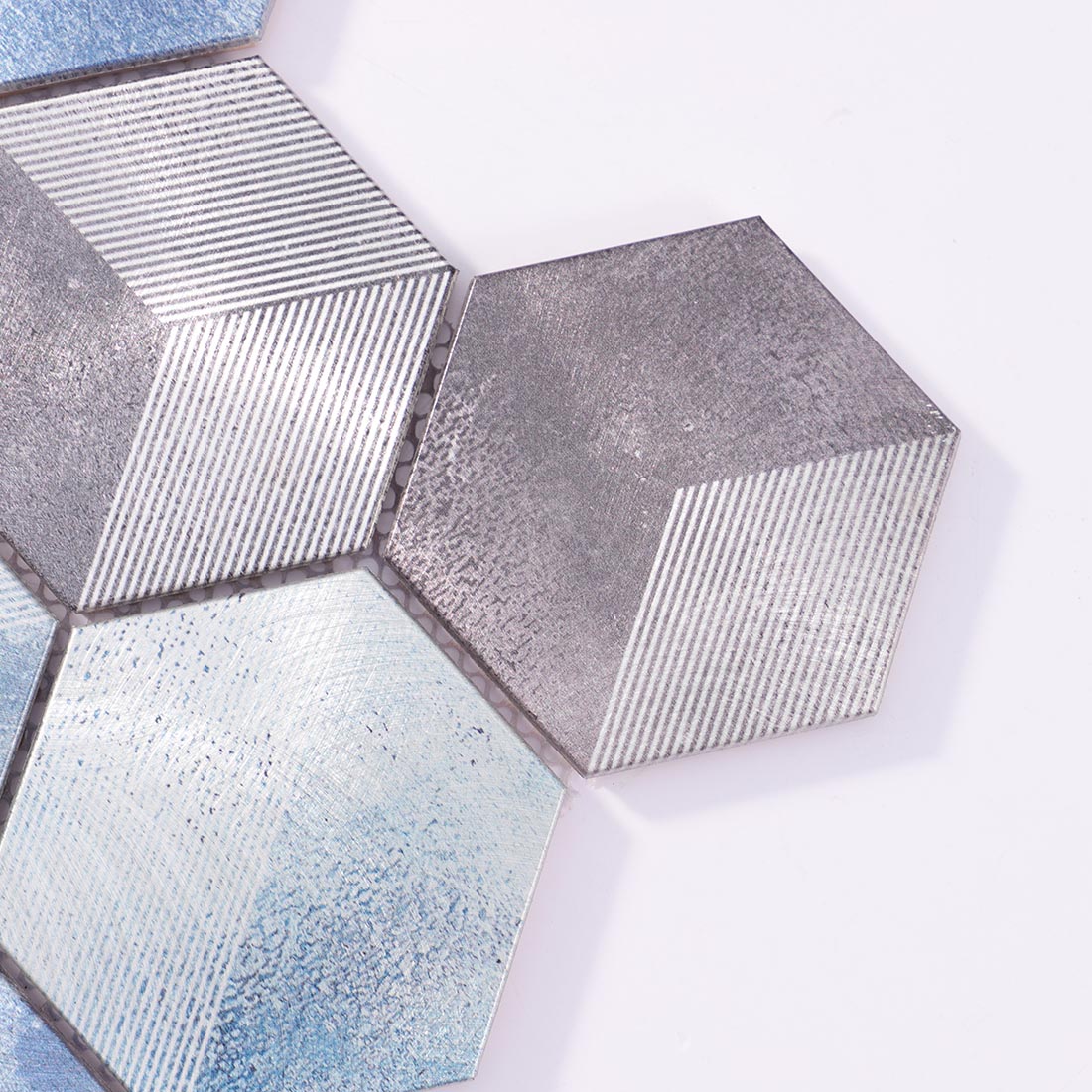 Close-up detail of blue and grey 3D pattern flat hexagon aluminum tile