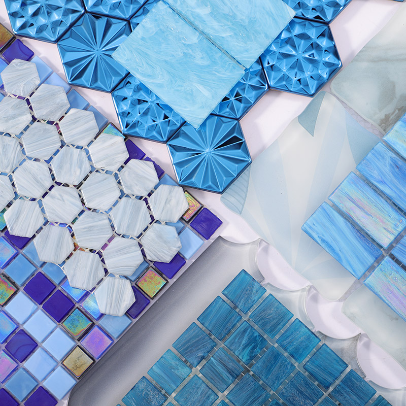 Blue glass, metal and mother of pearl mosaic tile samples in assorted shapes