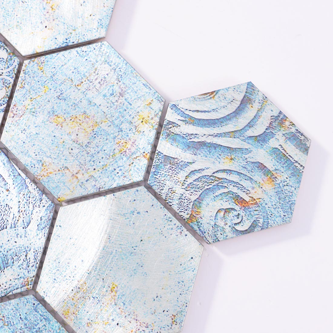 Close-up detail of blue vintage pattern hexagon aluminum mosaic tile