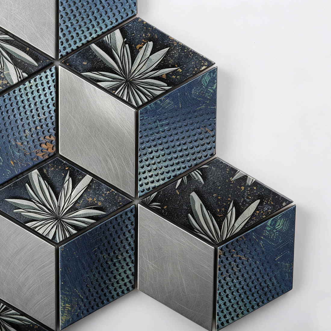 Close-up of blue silver floral aluminum cube mosaic tiles with textured metal surfaces
