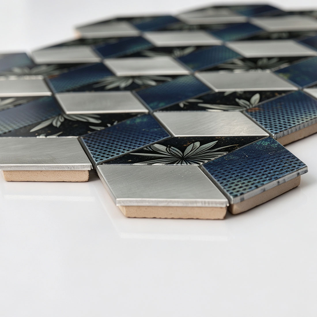 Side view of blue silver floral aluminum cube mosaic tiles showing thickness
