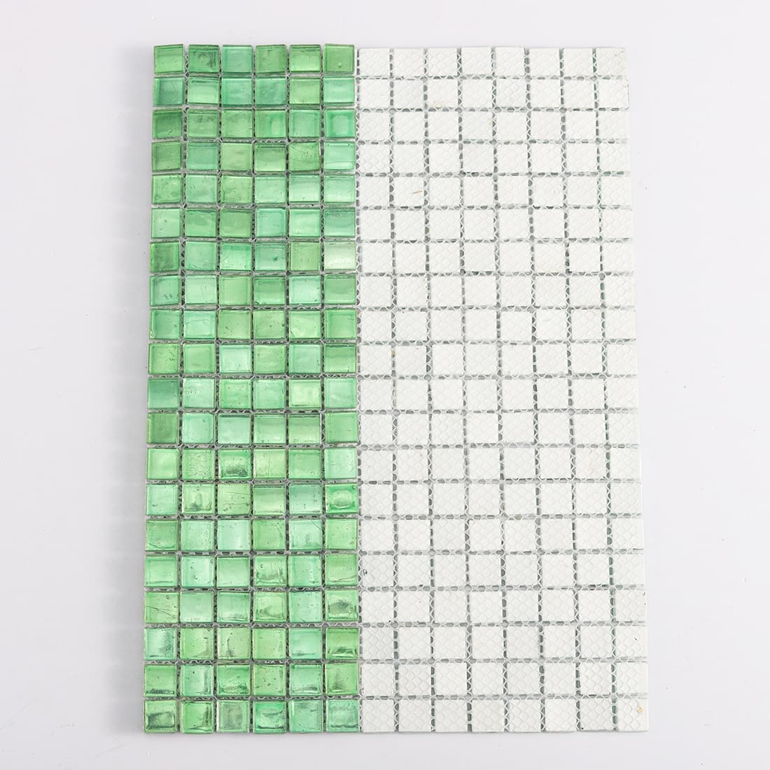 Back view of bright green square glass mosaic tile with mesh backing