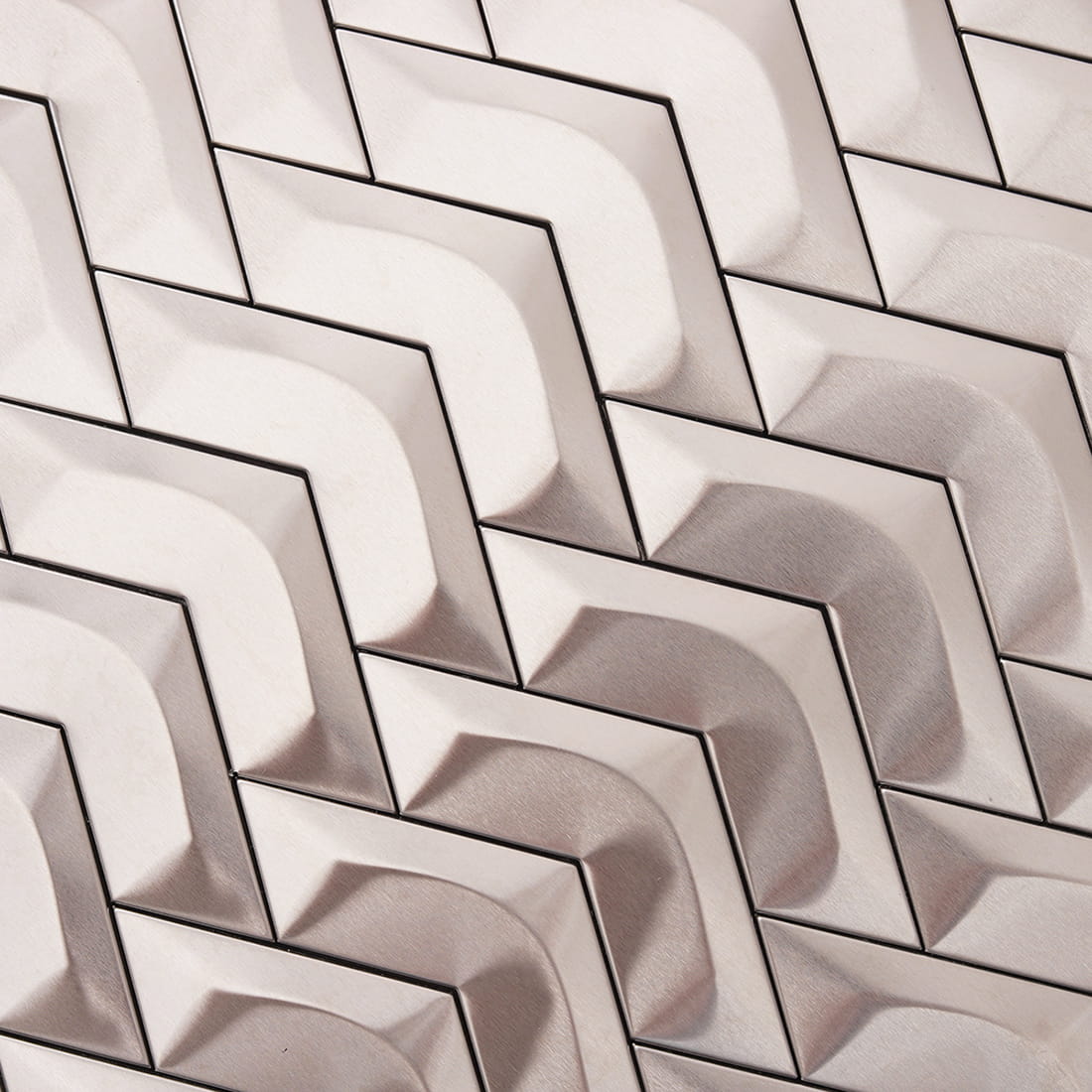 Close-up of brushed silver chevron stainless steel mosaic tile pattern