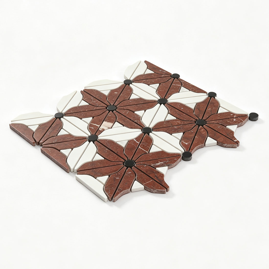 Angled display of burgundy and ivory floral marble mosaic tile with dark centers