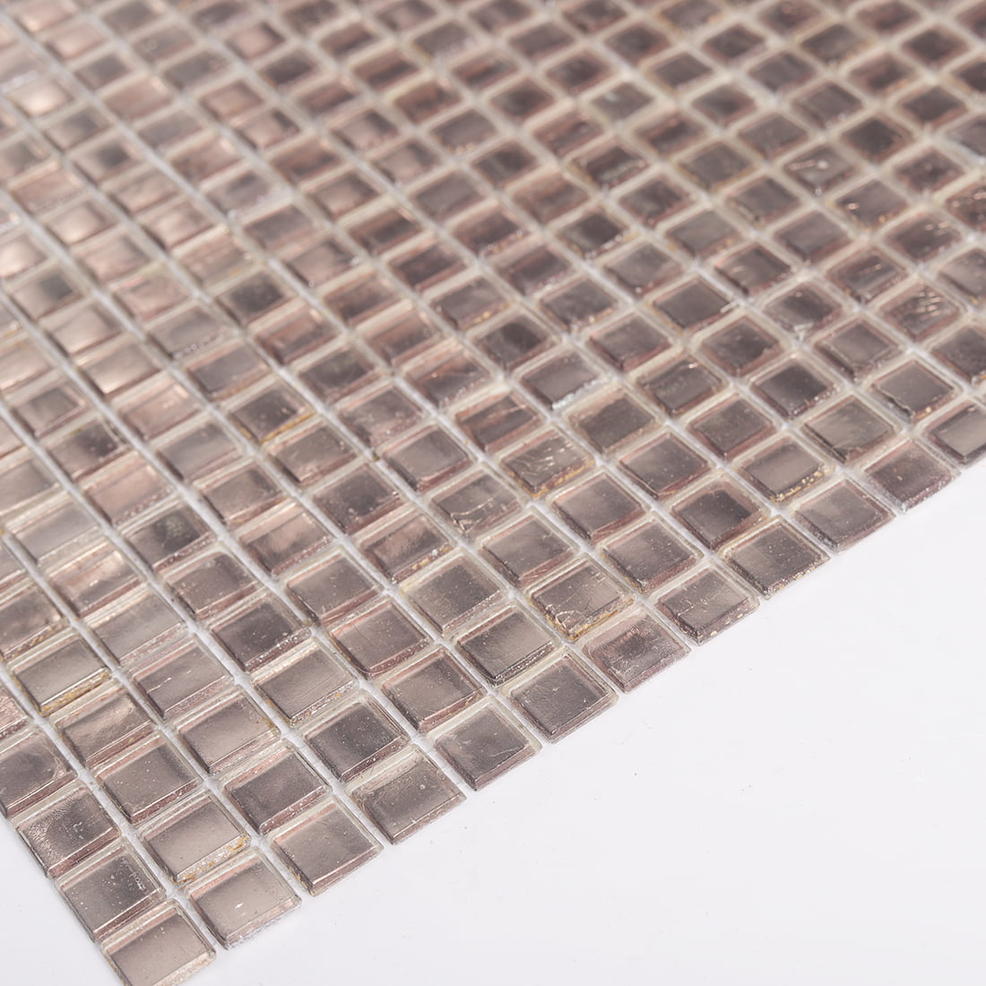 Angled close up of champagne square glass mosaic tiles