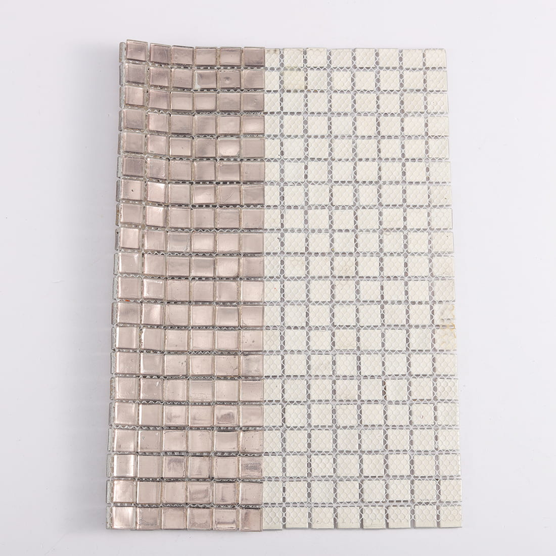 Back view of champagne square glass mosaic tile with mesh backing