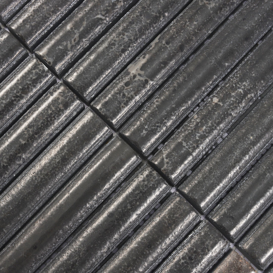Chocolate brown natural stone fluted tile texture with raised linear details