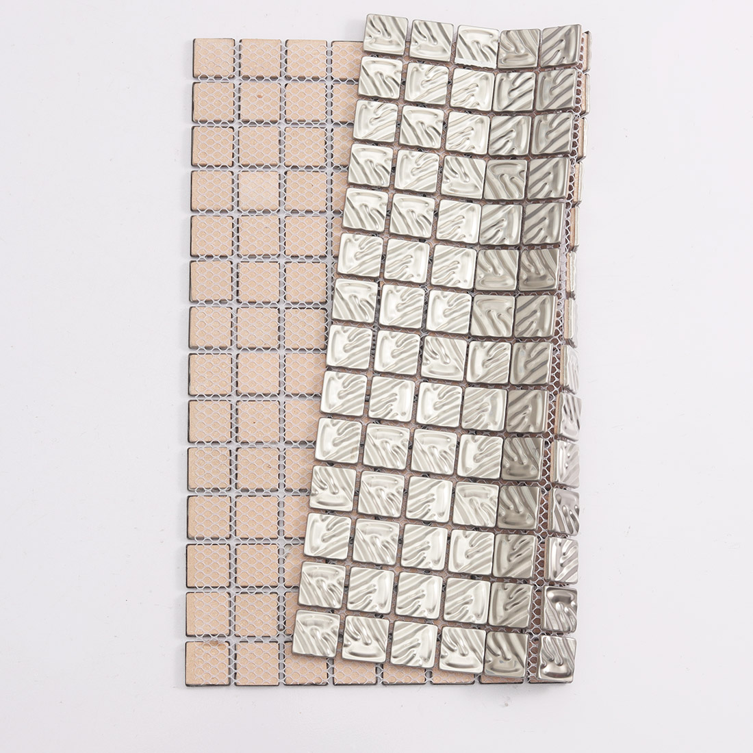 Chrome ripple mosaic tile showing shiny front chips and mesh mounted back
