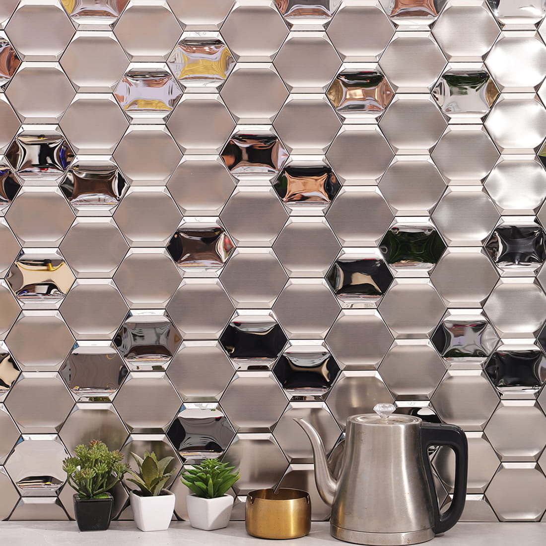 Close detail of silver brushed and mirror hexagon stainless steel backsplash tile