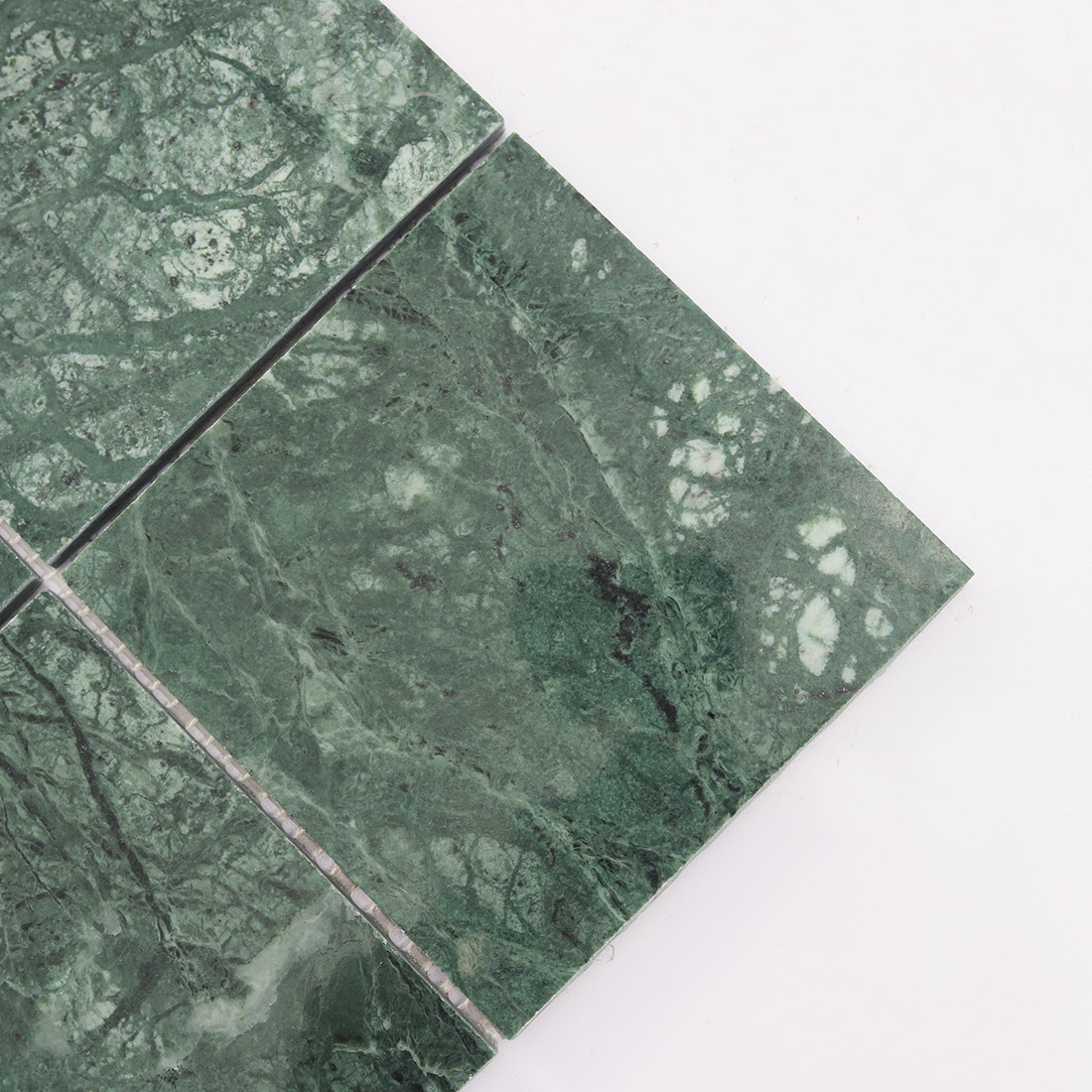Close up of dark green 98mm marble square tile with natural stone pattern
