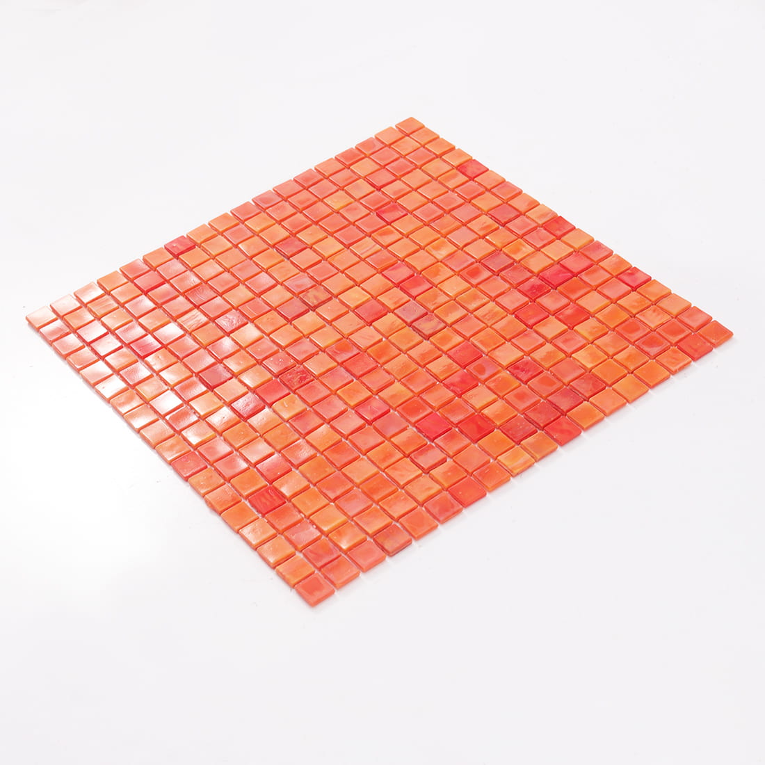 Angled view of coral orange square glass mosaic tile sheet