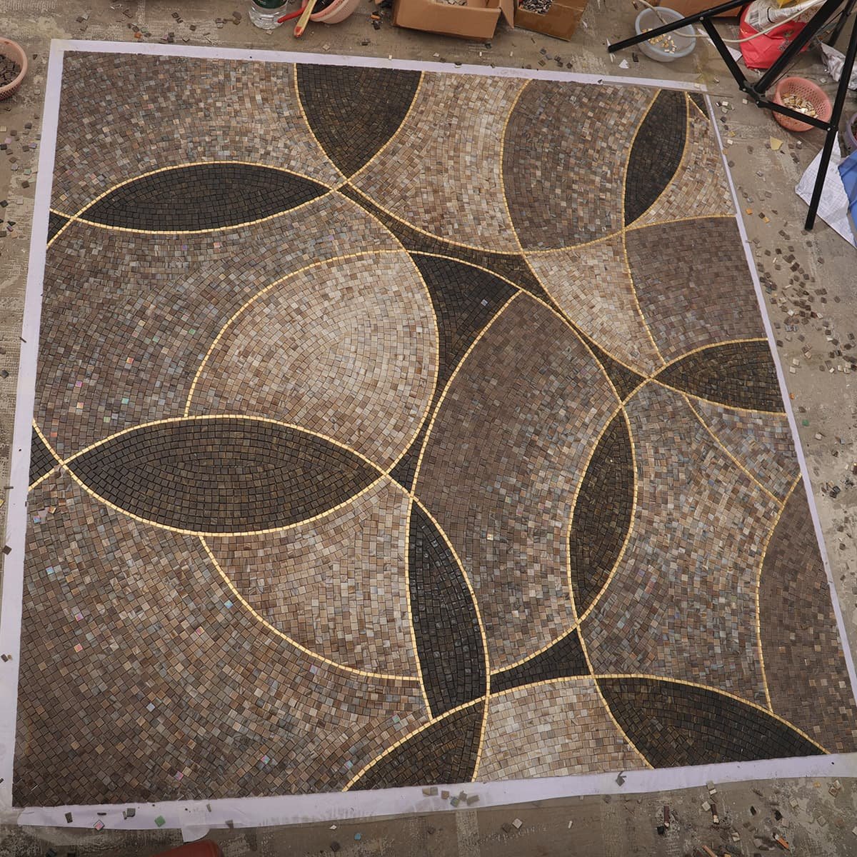 Custom handcrafted glass mosaic panel being prepared for installation