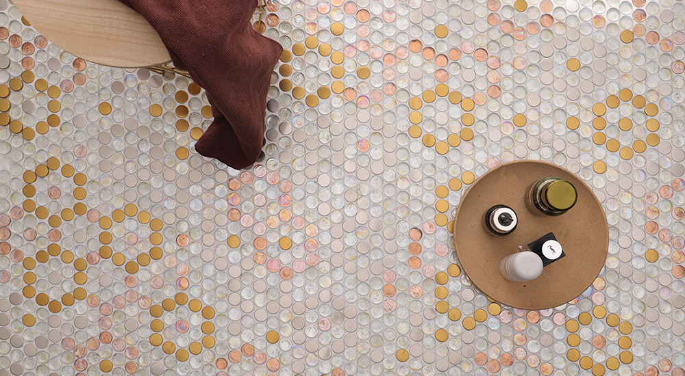 {"default":"Penny tile floor with a luxury mix of iridescent glass and gold rounds for bathroom floors."}
