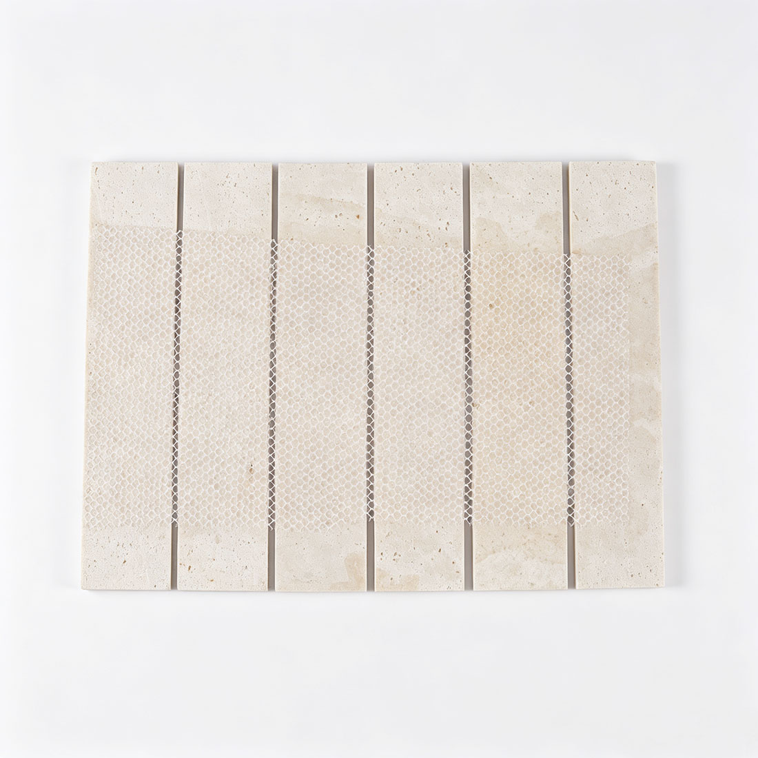 Mesh backing on the reverse side of light grey marble mosaic