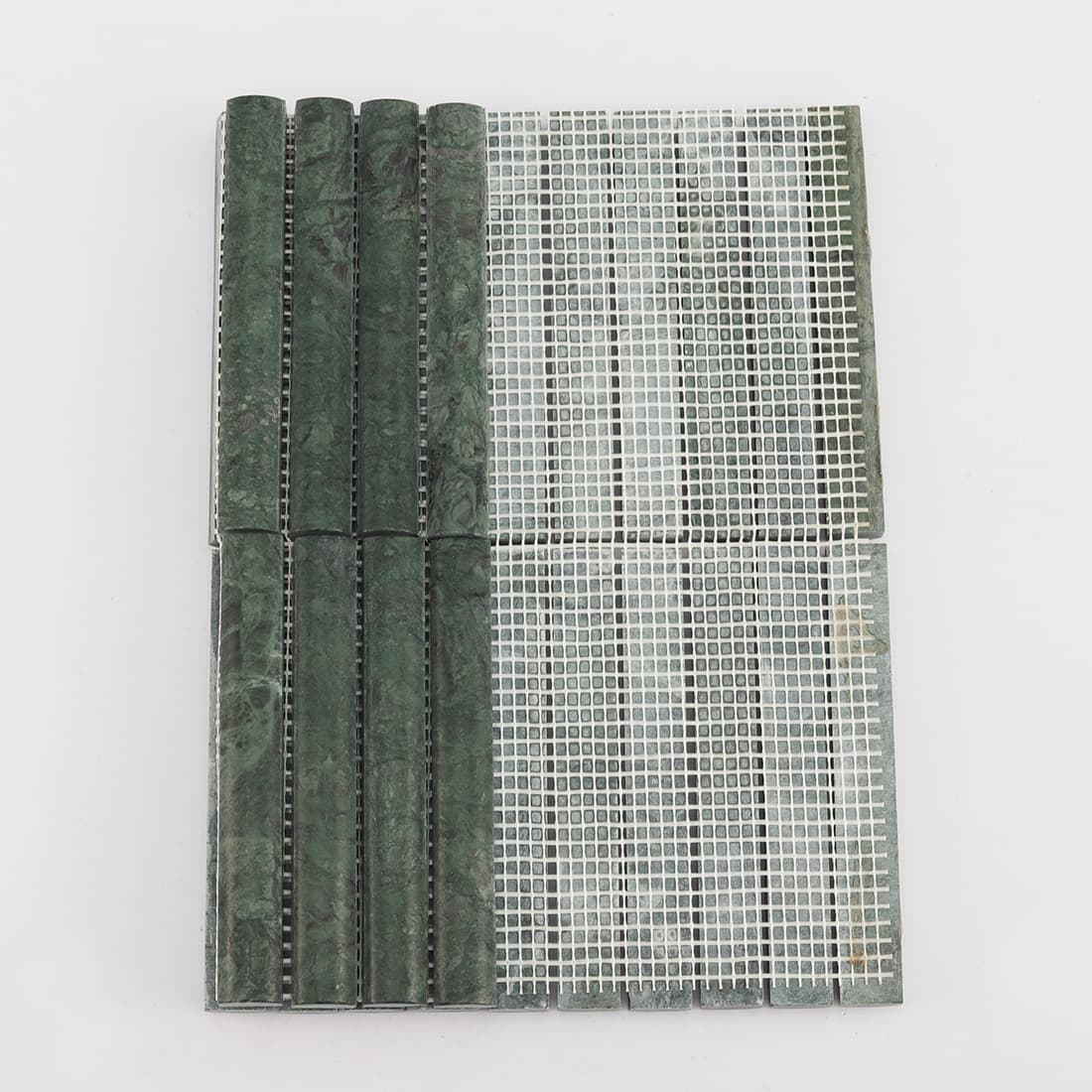Back view of dark green marble finger mosaic tile with mesh backing