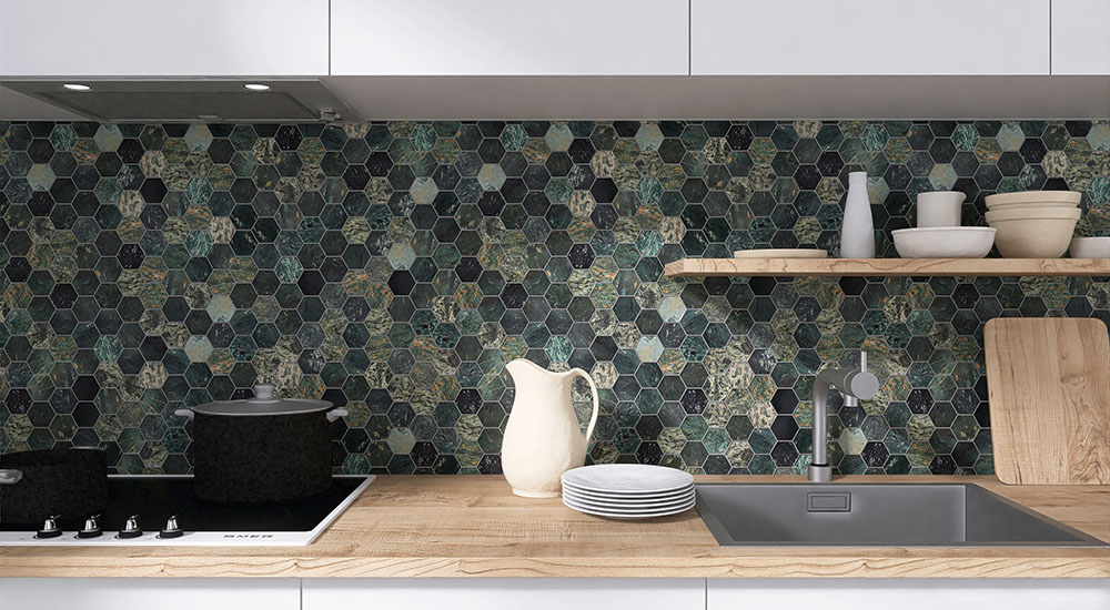 {"default":"Dark green marble hexagon mosaic tile backsplash in a modern kitchen with wooden countertop."}
