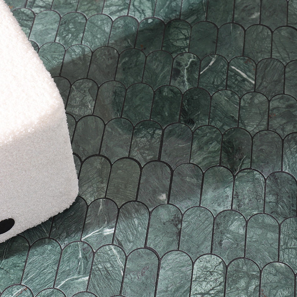 Dark green marble scallop mosaic tile floor scene with white stool